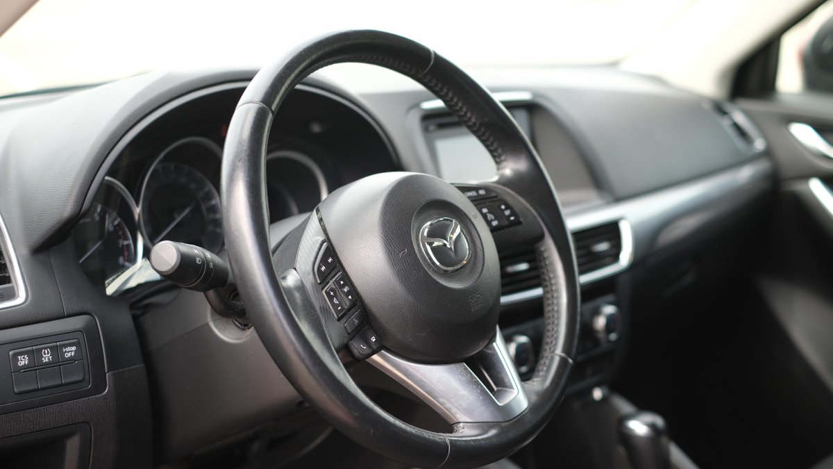 Мазда СХ 5 кнопка TCS