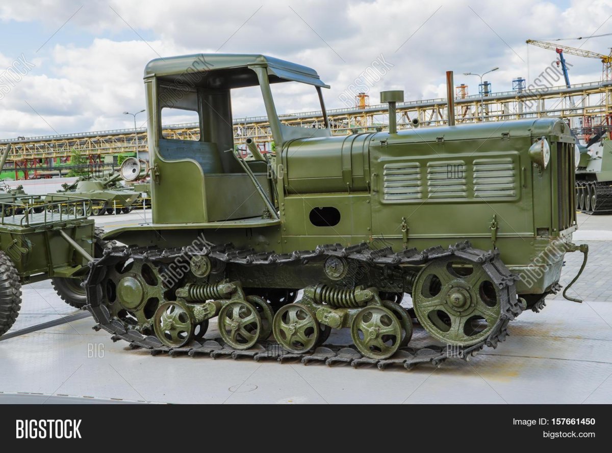 Гусеничным трактором СТЗ-3.
