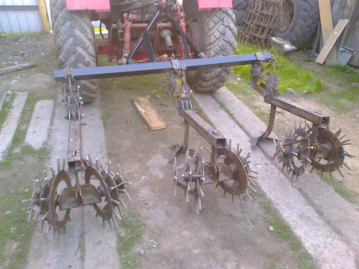 Культиватор окучник на т 25