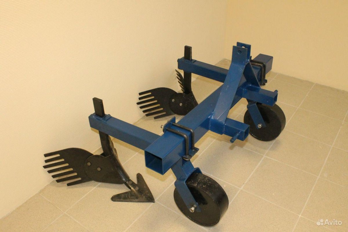 Культиватор окучник на т 25