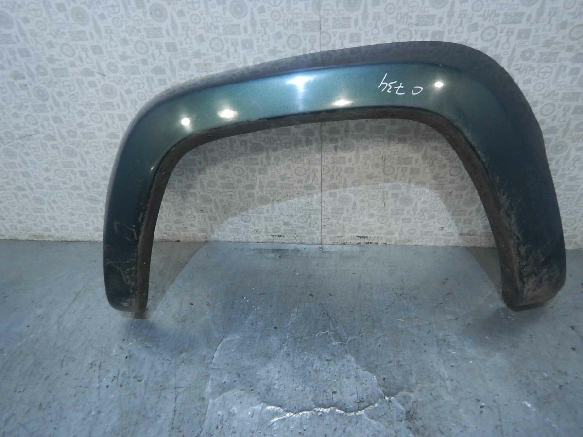 Накладка на крыло левое Jeep Cherokee 1989