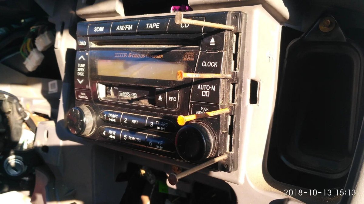Мазда трибьют замена магнитолы