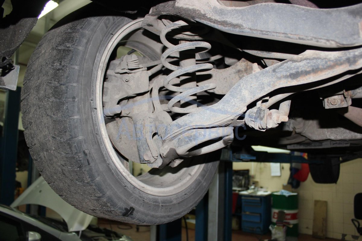 Задняя подвеска Мазда Демио