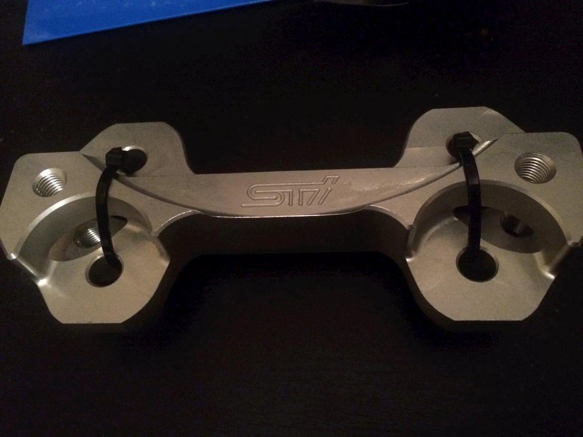 Переходники для установки задних двухпоршневых суппортов Subaru