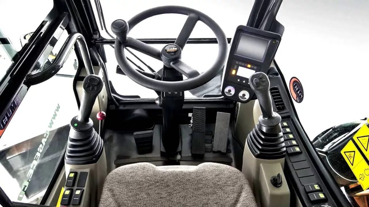 Управление колесным экскаватором Вольво