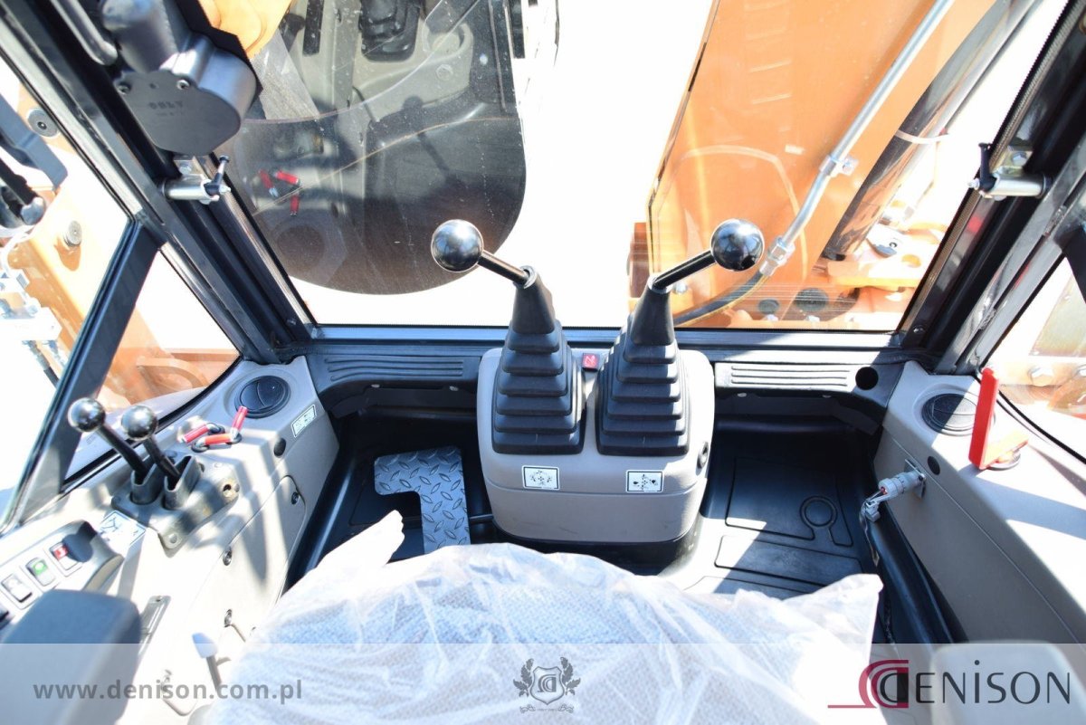 Кейс 570 St распределитель