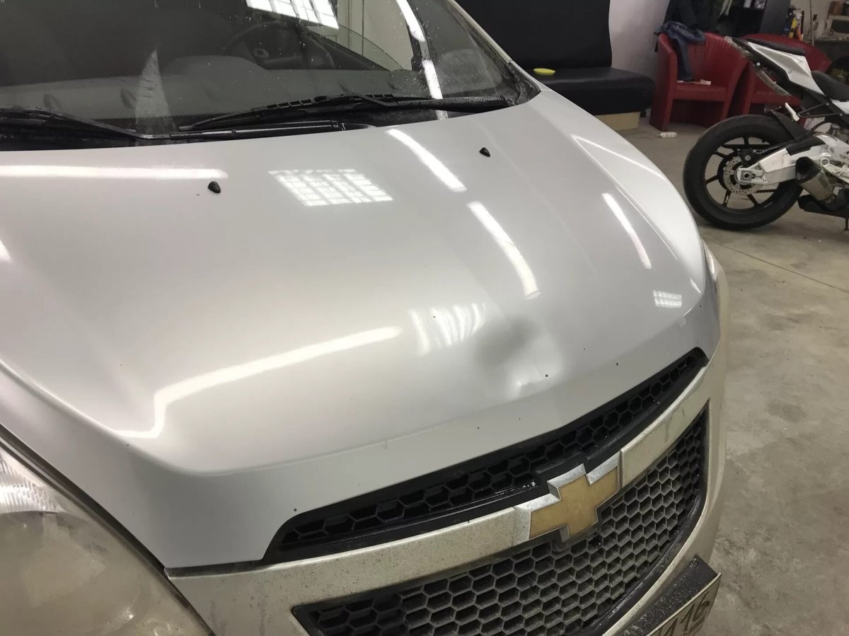 Вмятина на алюминиевом капоте