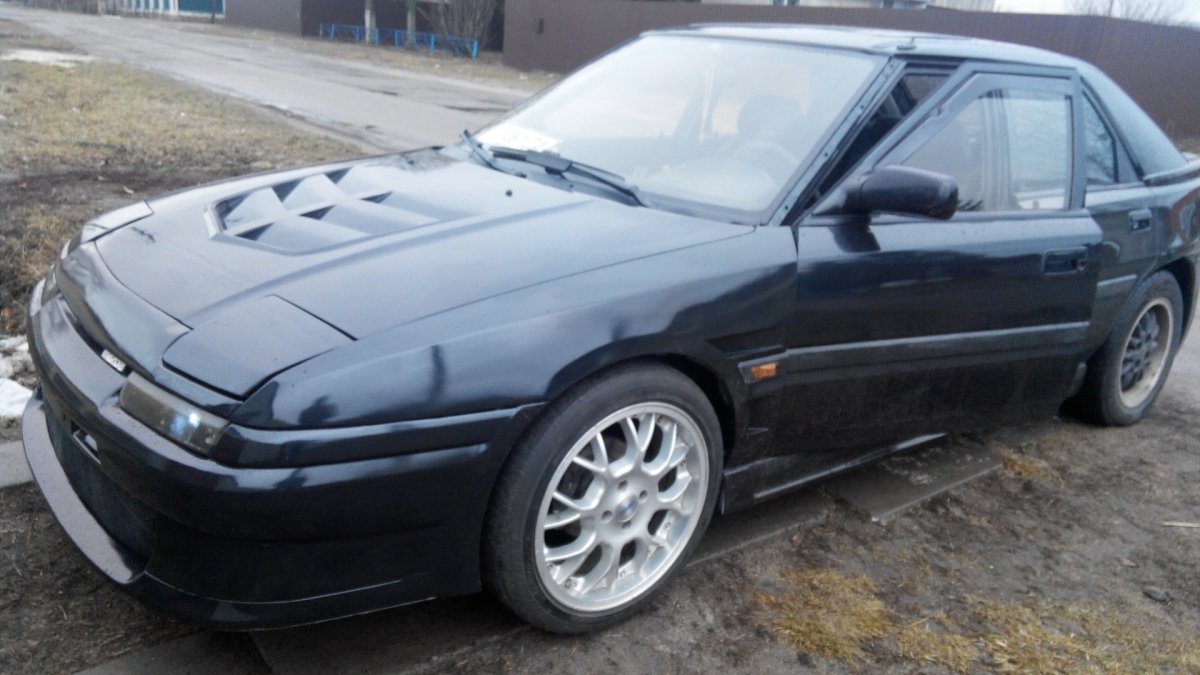 Мазда 323 f bg черная
