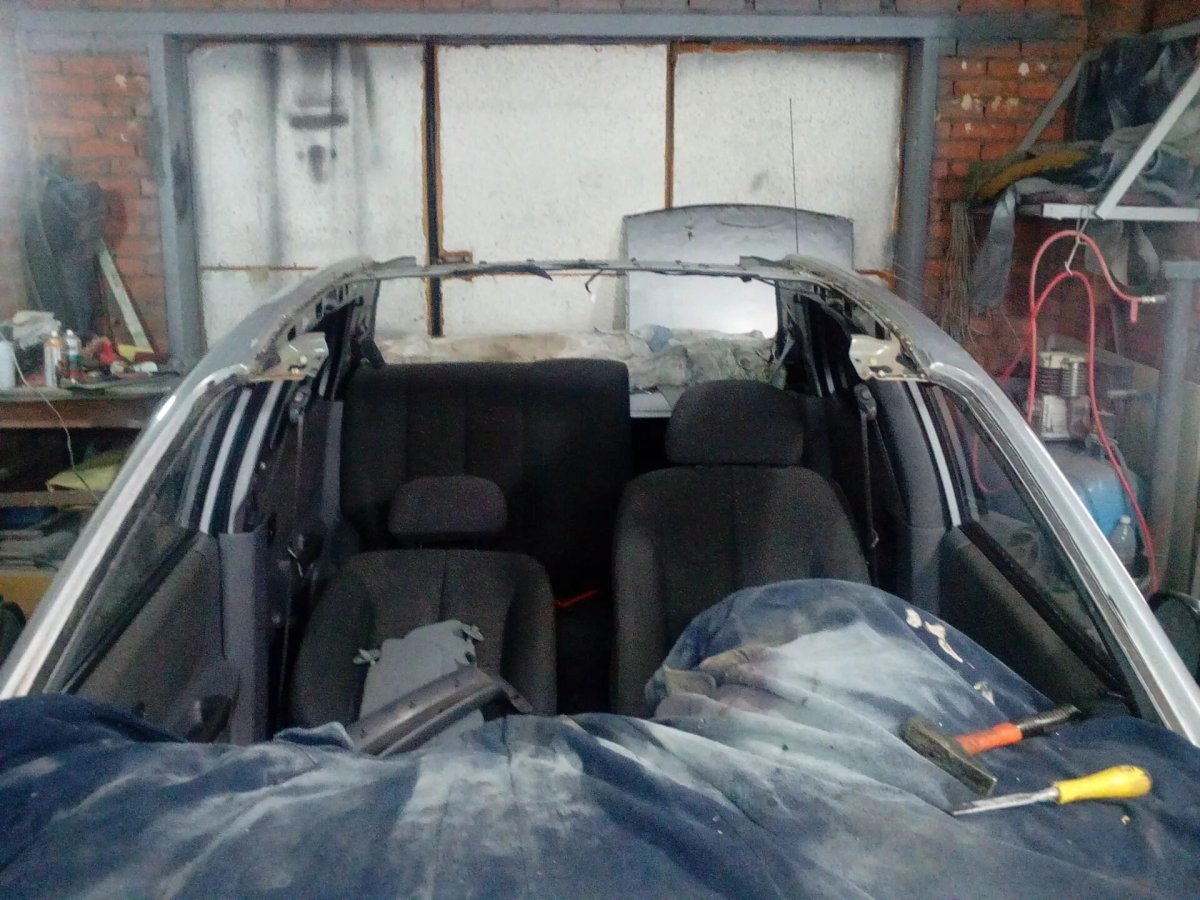 Замена полотна крыши автомобиля