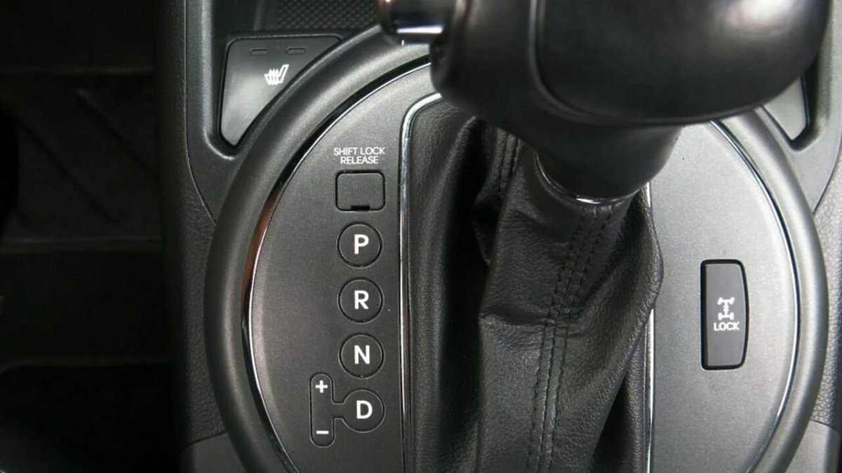 Kia Sportage 3 кнопка на АКПП