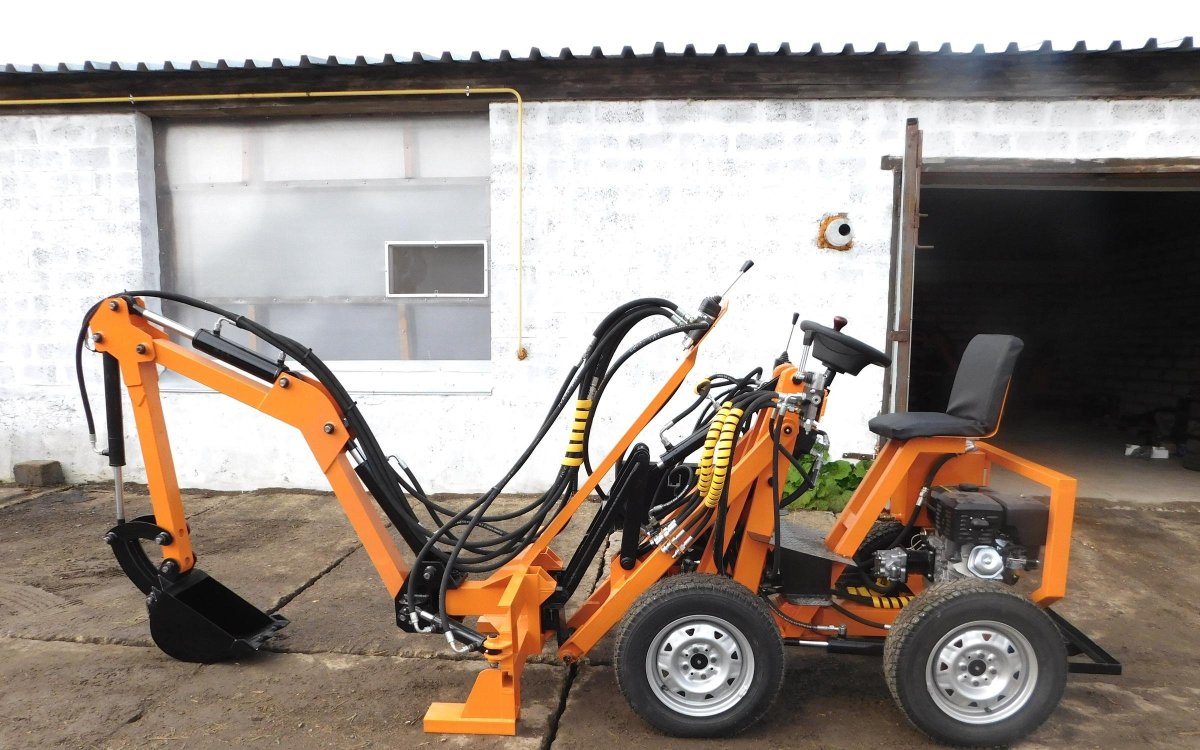 Колесный мини экскаватор-погрузчик Allmand TLB 325