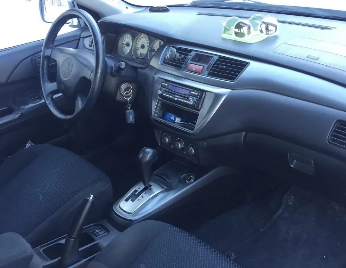 Лансер 9 салон автомат