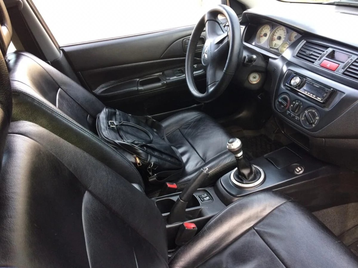 Кожаный салон Лансер 9