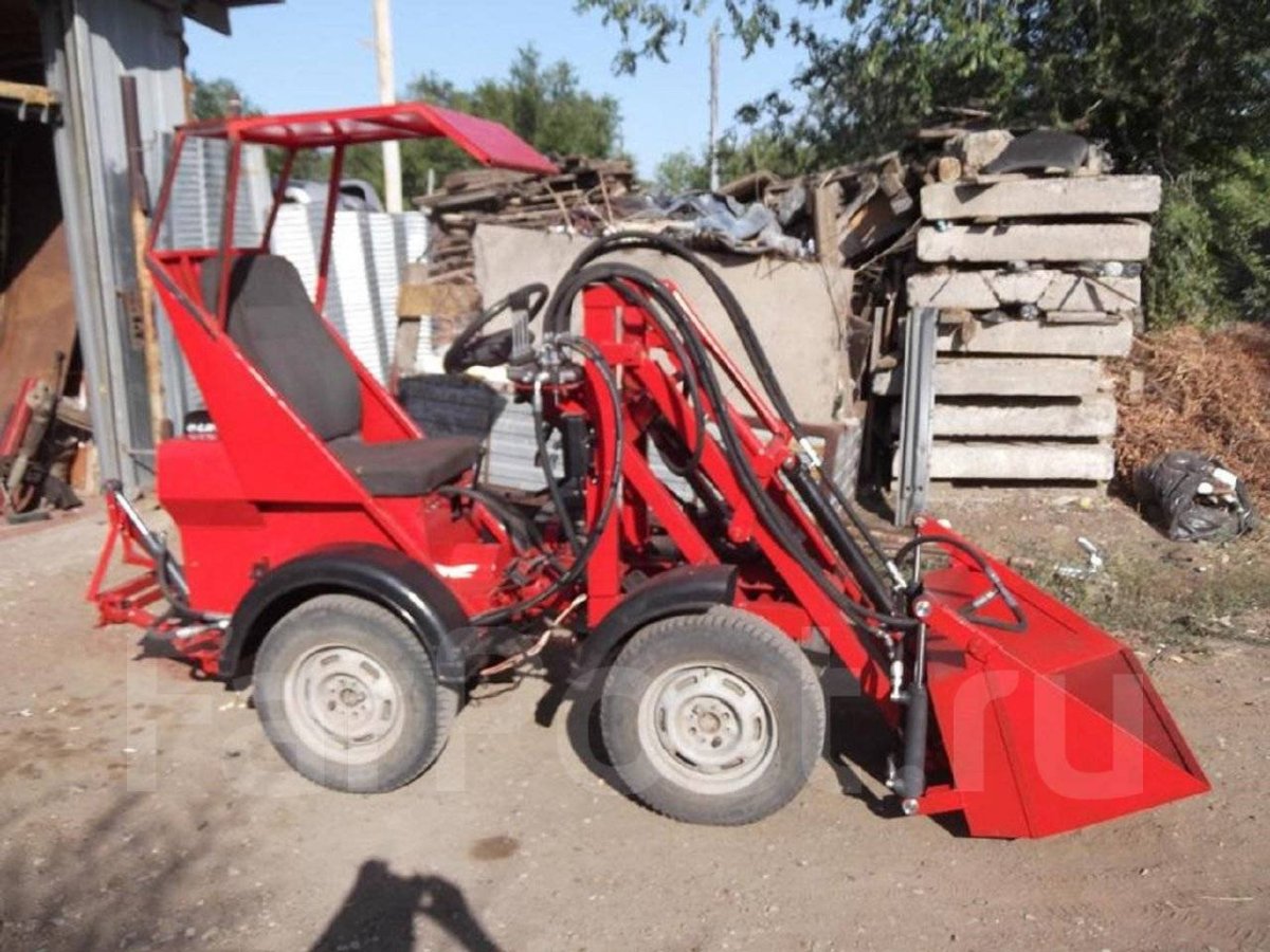 Фронтальный погрузчик мини переломка