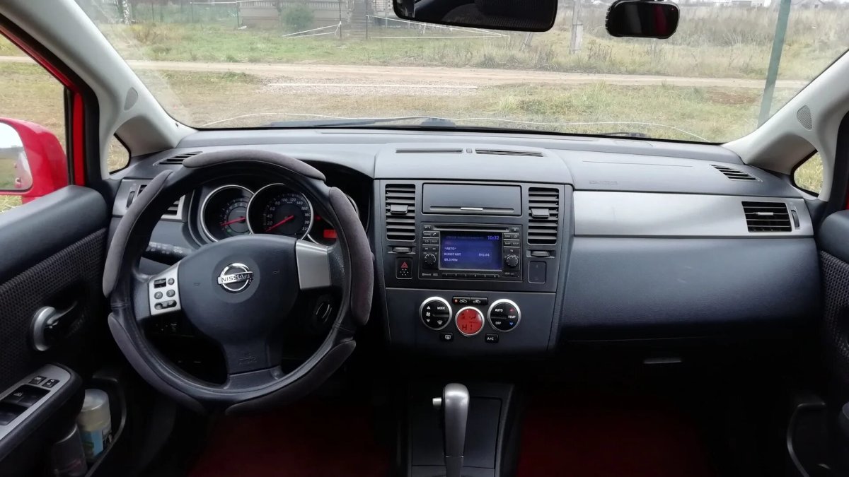 Tiida 2010 салон