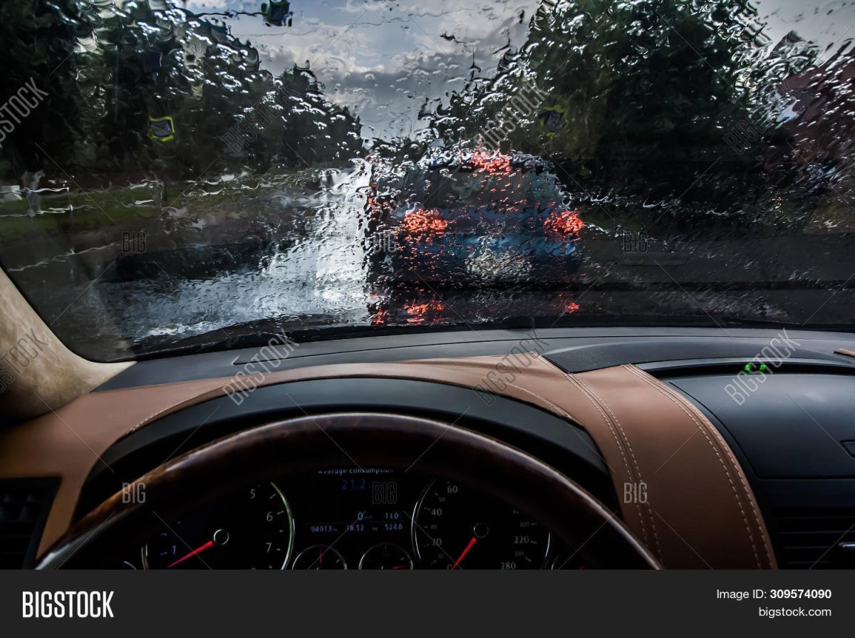 Cars Driving in the Rain