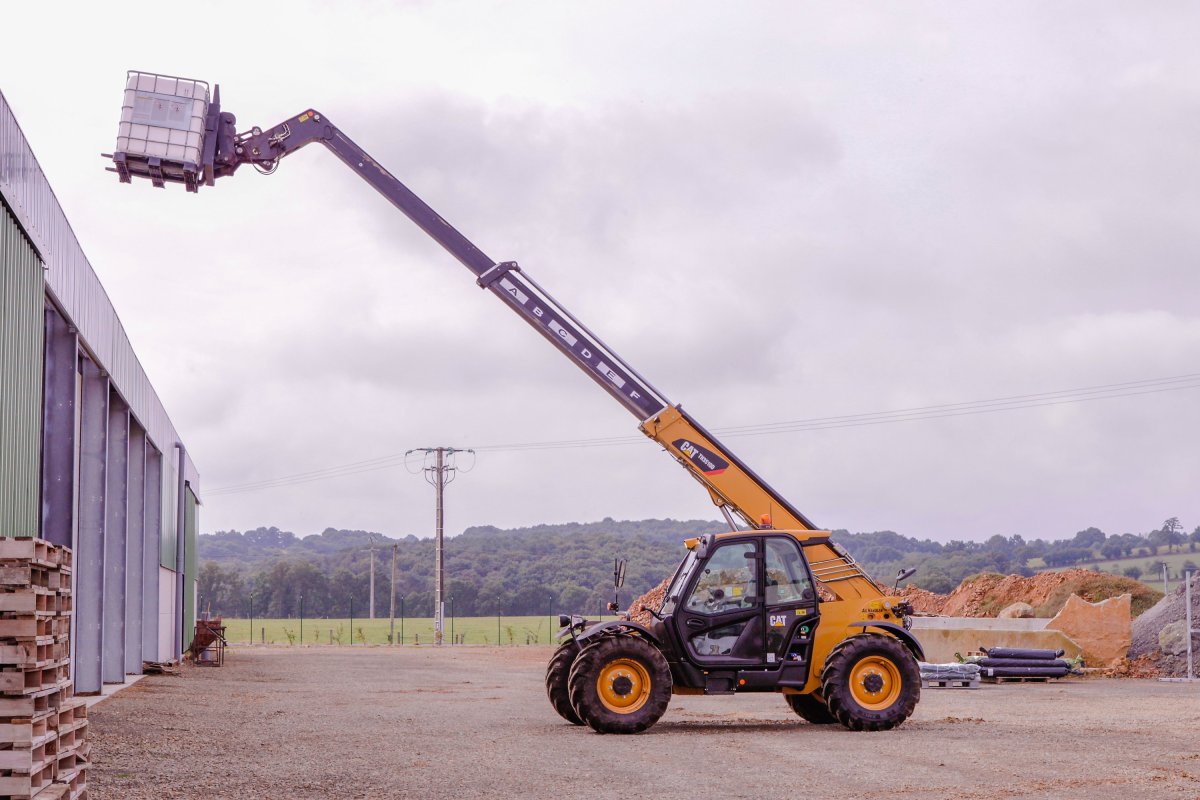 Телескопический погрузчик Катерпиллер