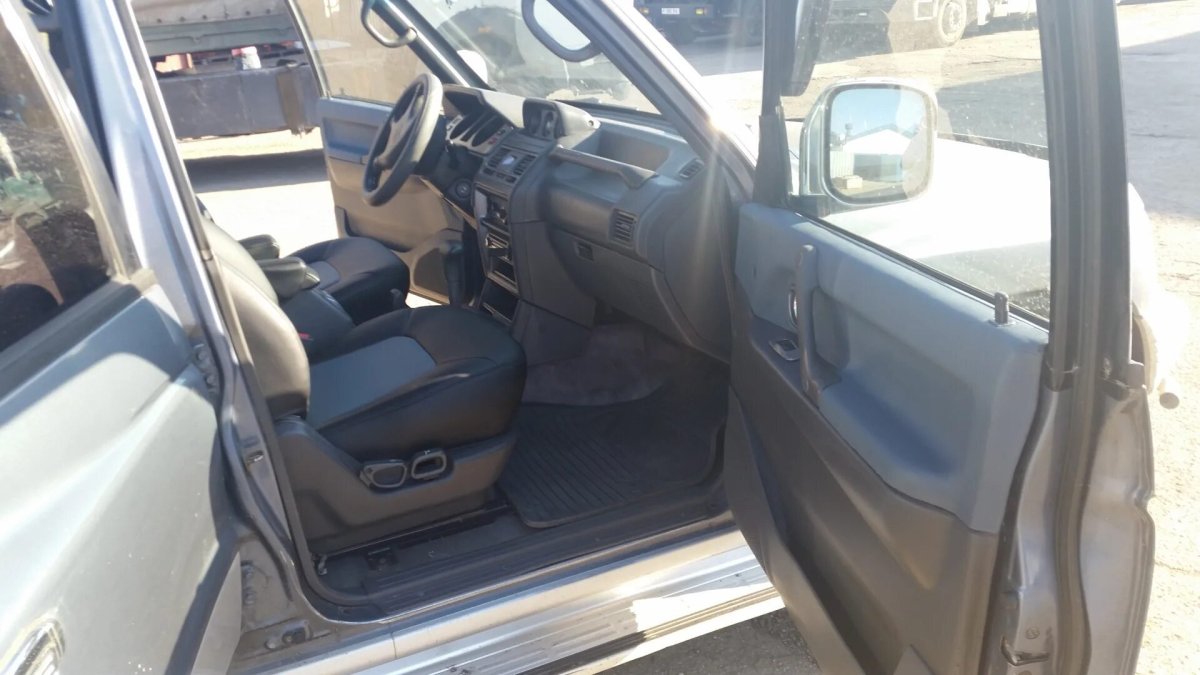 Обшить салон Митсубиси Паджеро-2