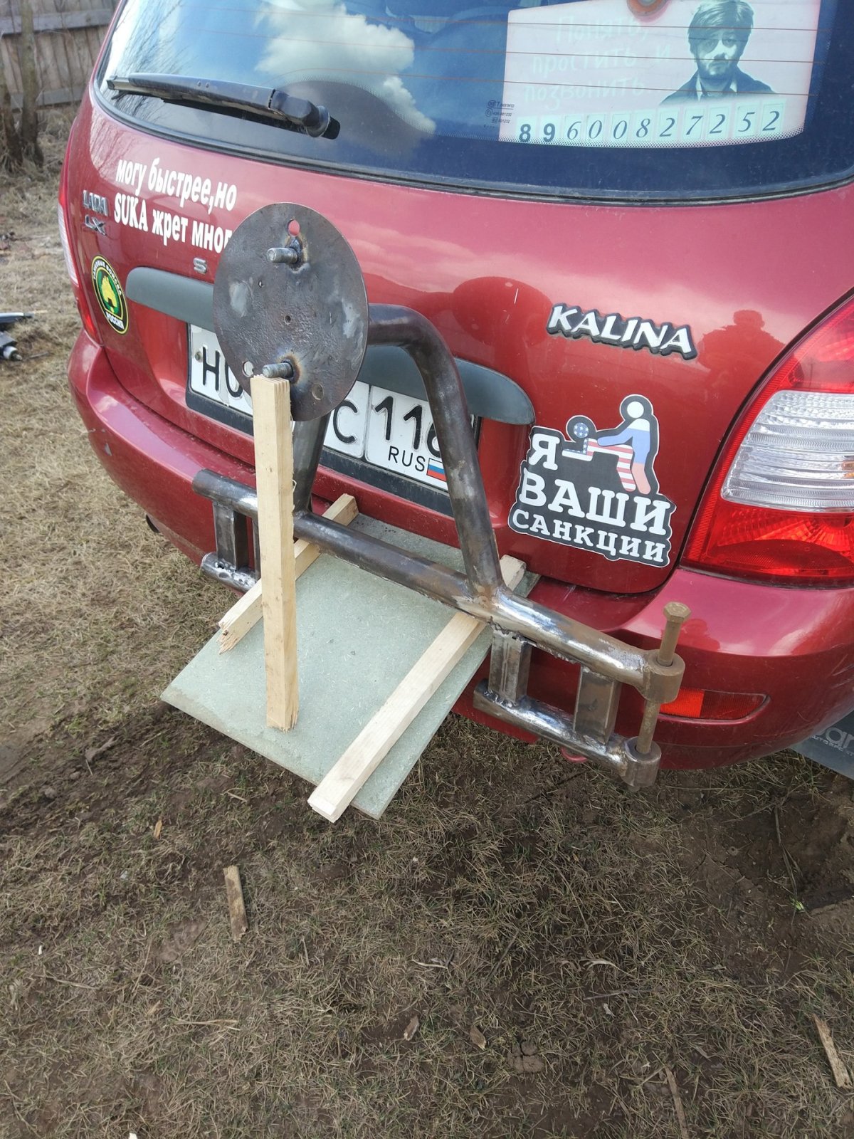 Лада Калина крепление запасного колеса