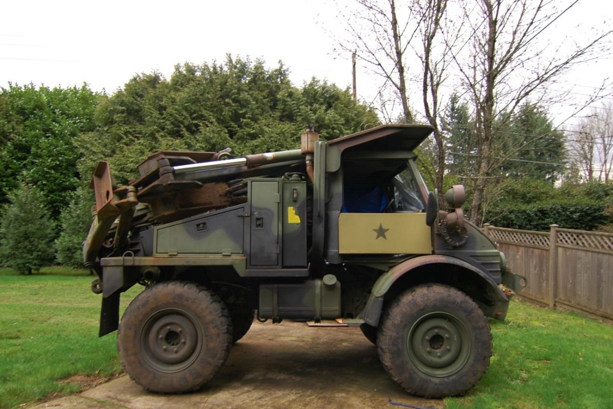 Unimog экскаватор погрузчик