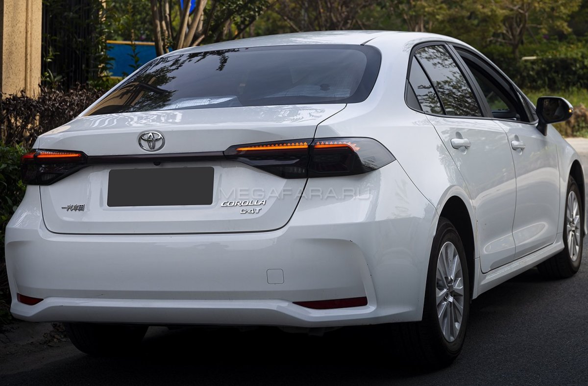 Тойота Королла е210