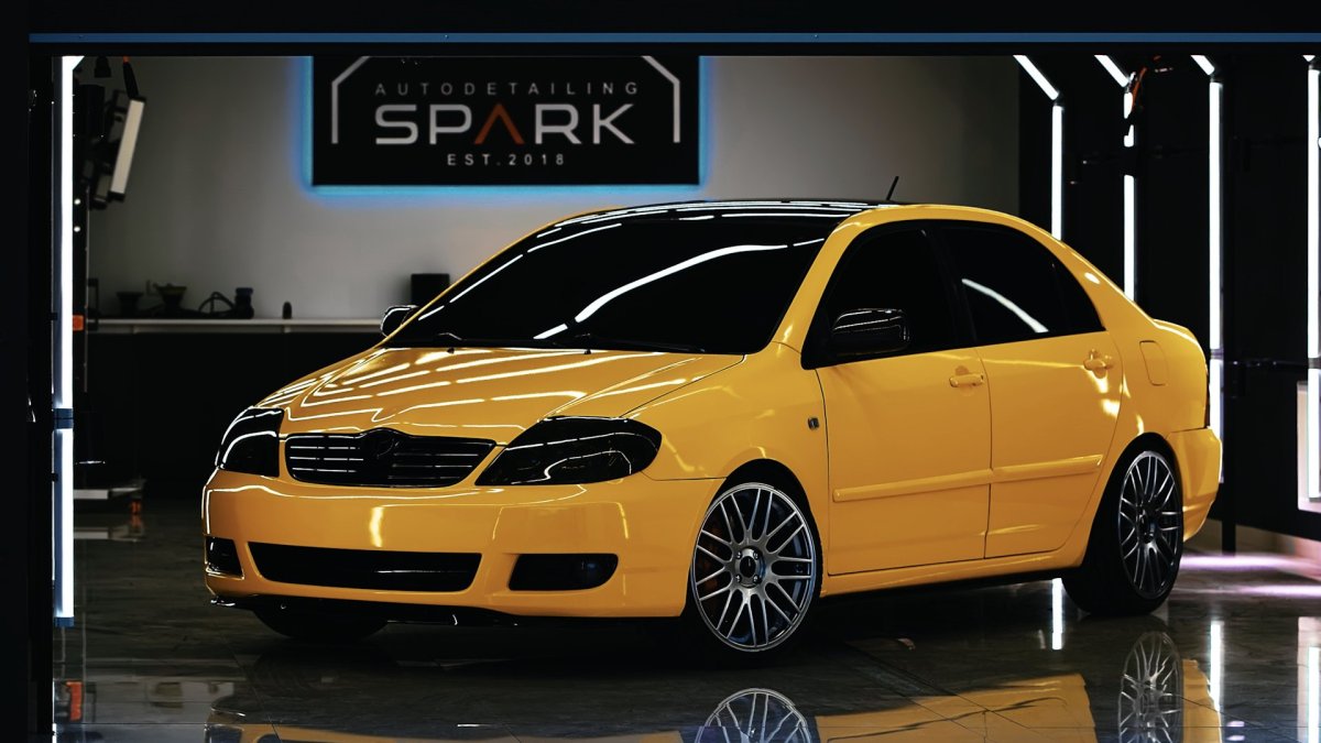 Тойота Королла 120 желтая