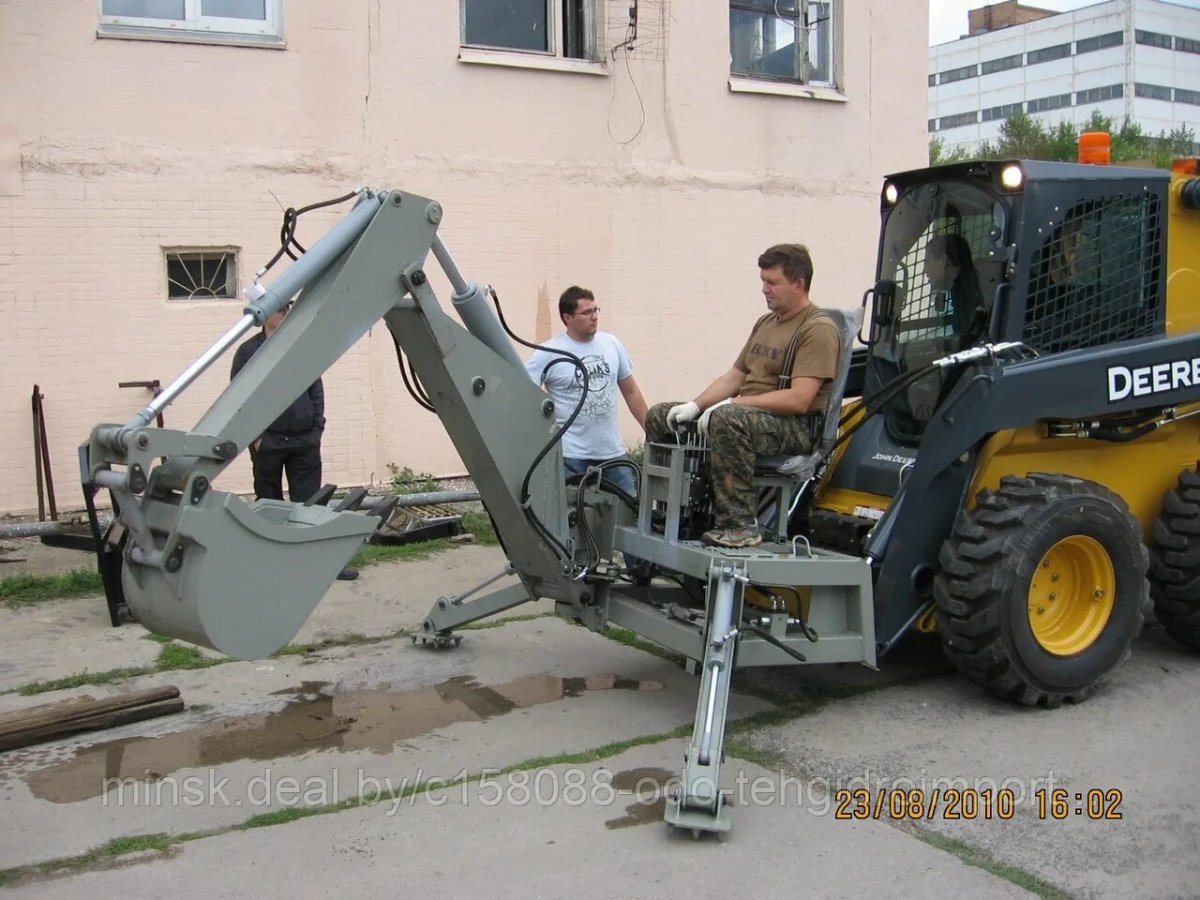Навесной экскаватор Бобкэт