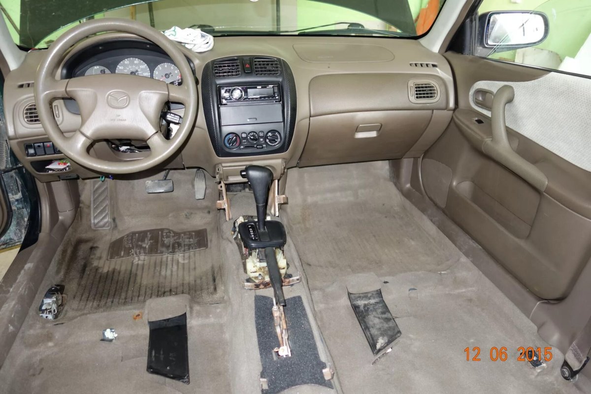 Мазда 323 2002 года дизель салон