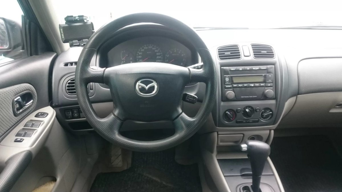 Mazda 323 vi bj салон