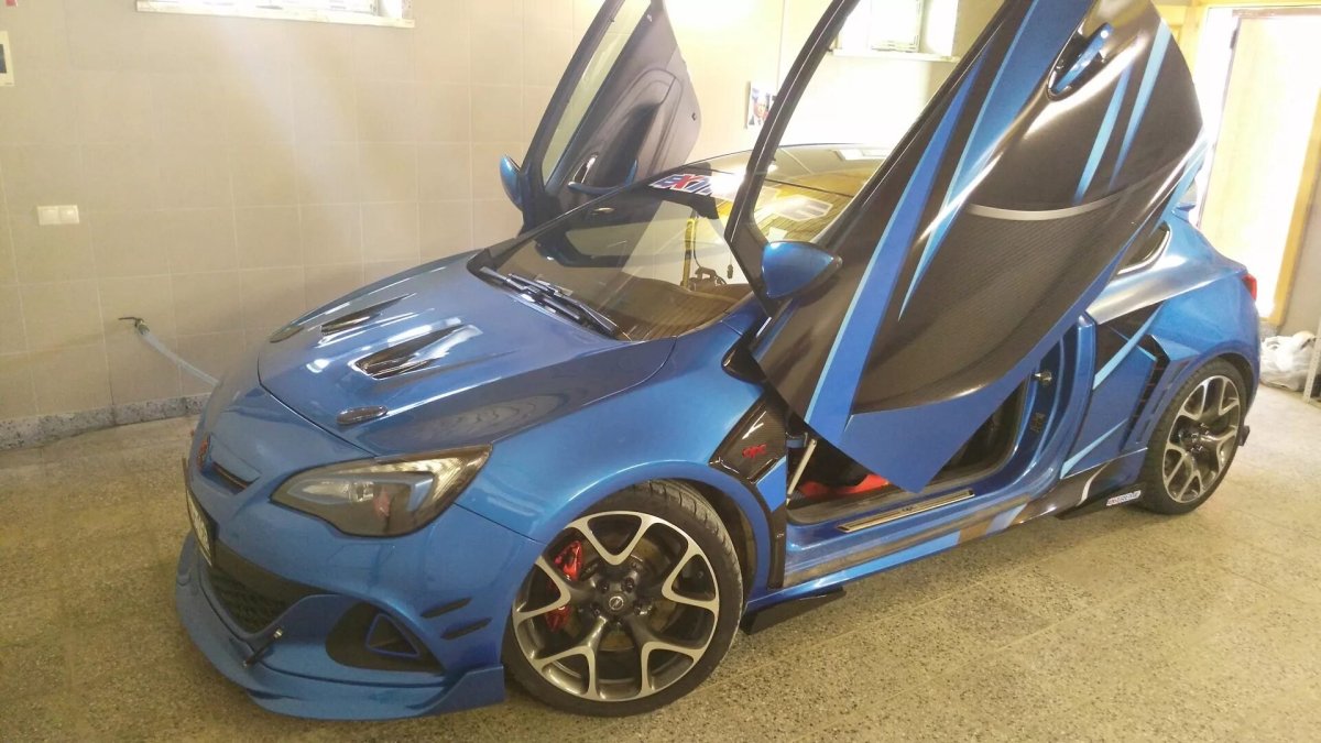 Капот Opel Astra j GTC