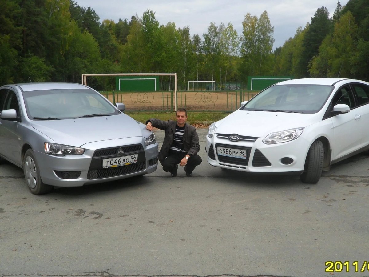 Форд Лансер