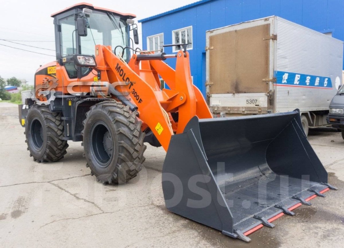 Фронтальный погрузчик молот 300f