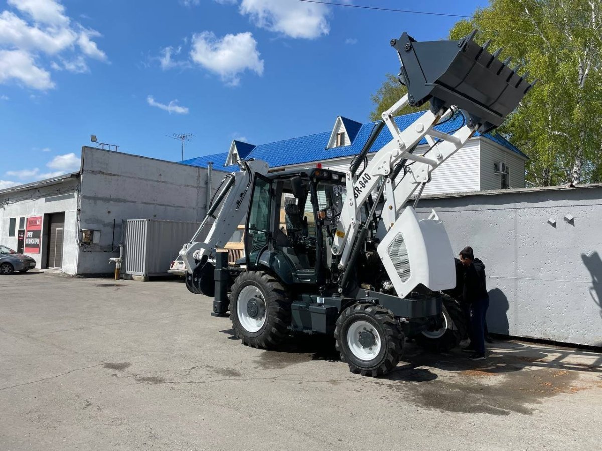 Экскаватор погрузчик Разноколесный