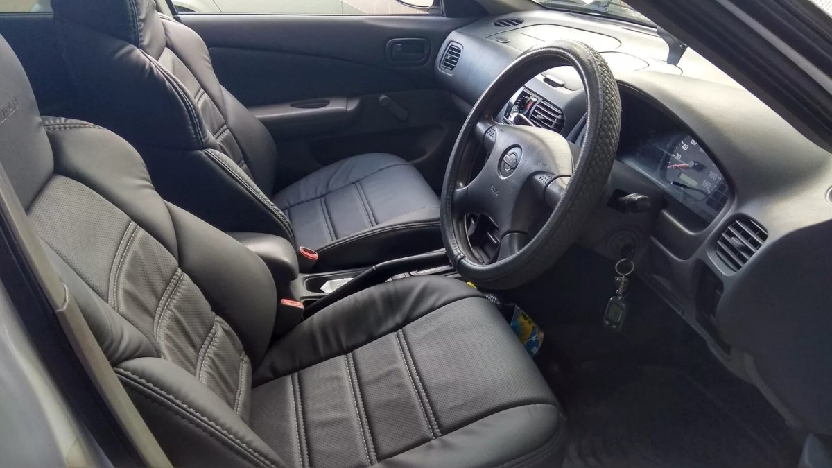 Ниссан Санни н16 серый салон кожа