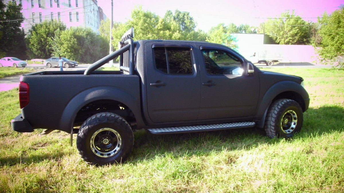 Ниссан Навара черный Раптор