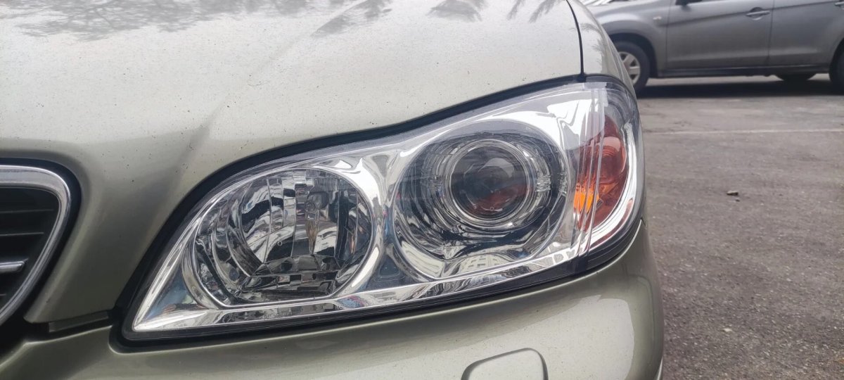 Линза в фару Nissan maxima a33