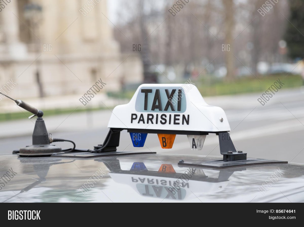 Памятник парижскому такси