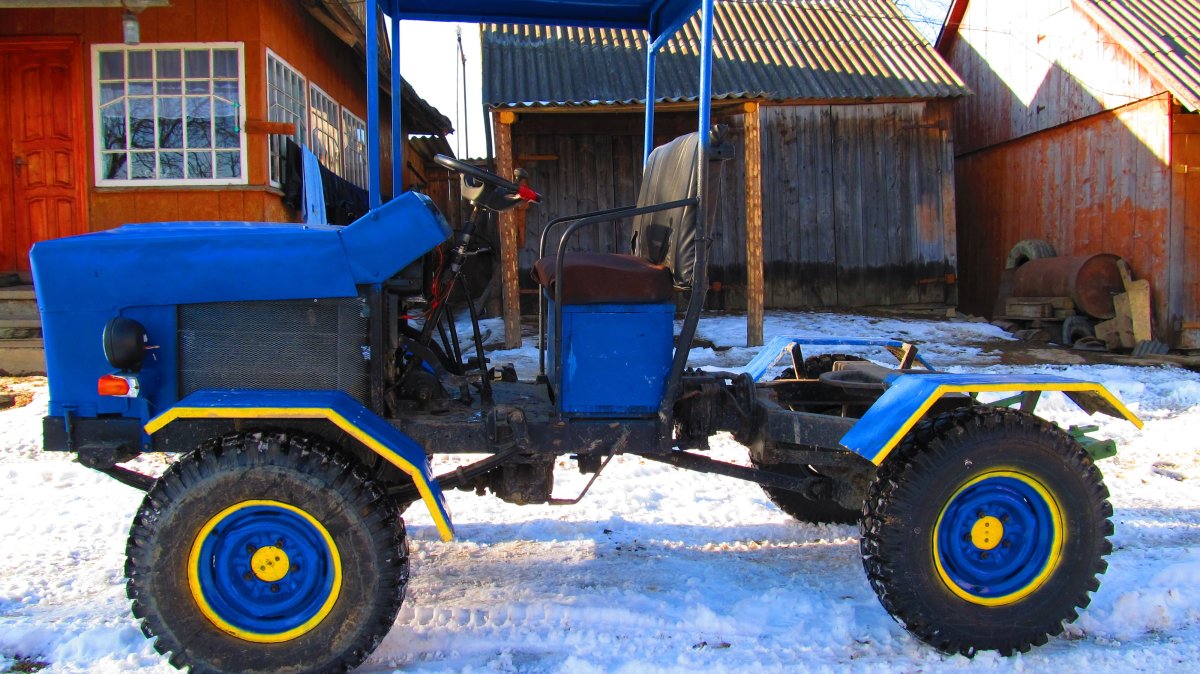 Минитрактор переломка Уралец