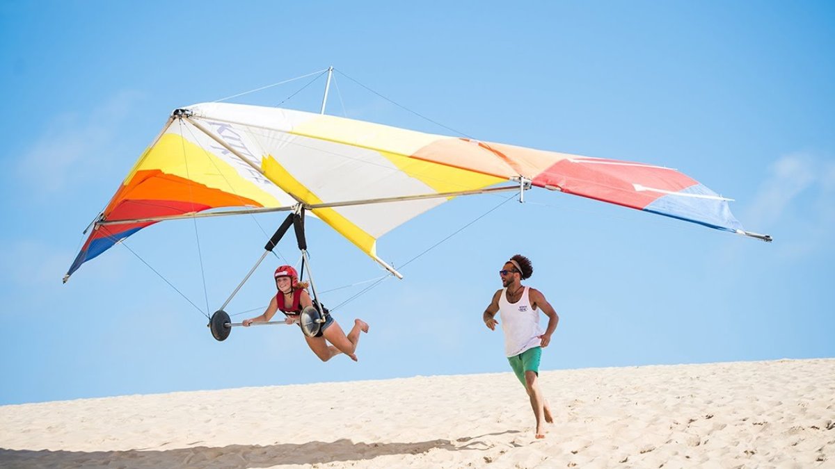 Летать на дельтаплане