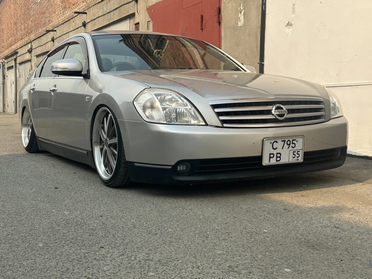 Ниссан Айра