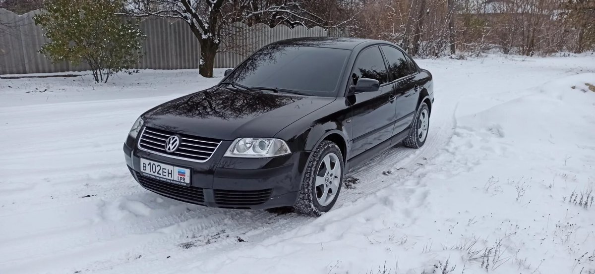 Passat черный металлик