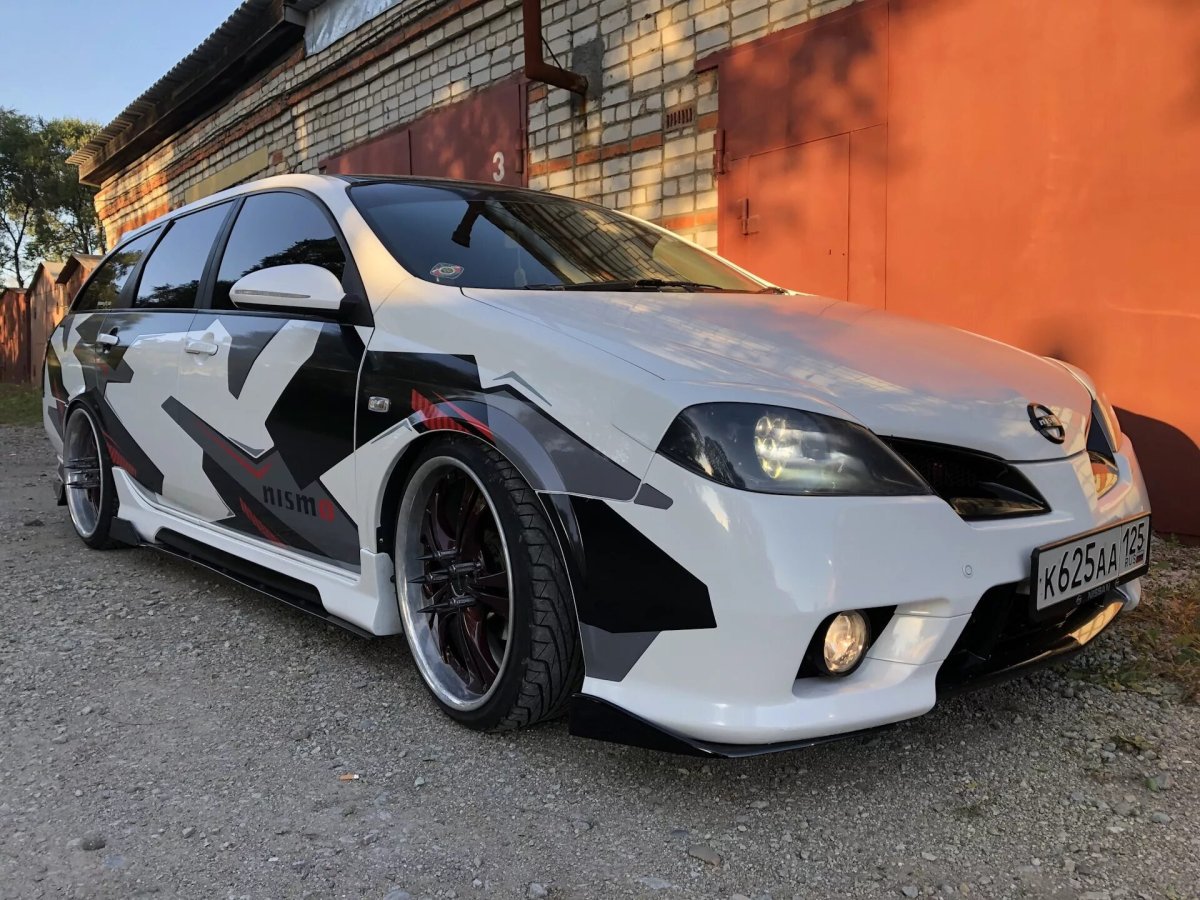 Обвес на Ниссан Альмера н16