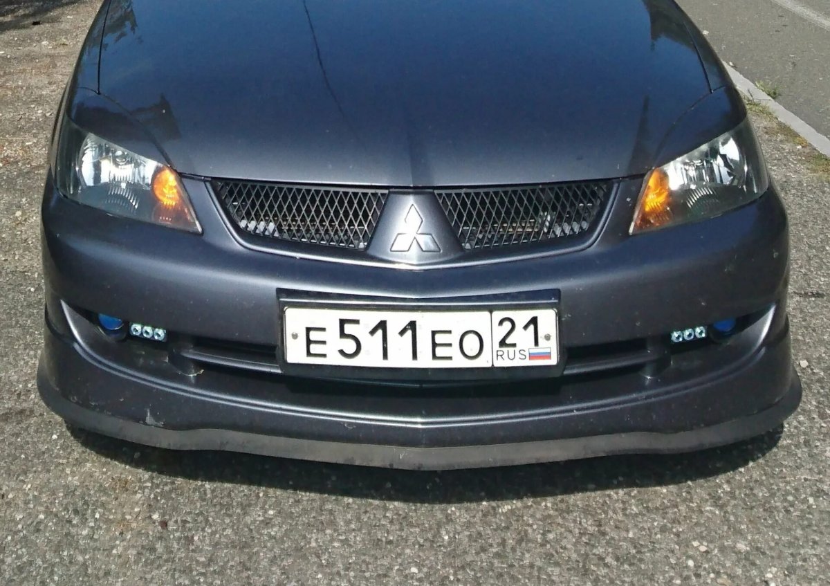 Лансер 9 чёрный с полноразмерными противотуманками