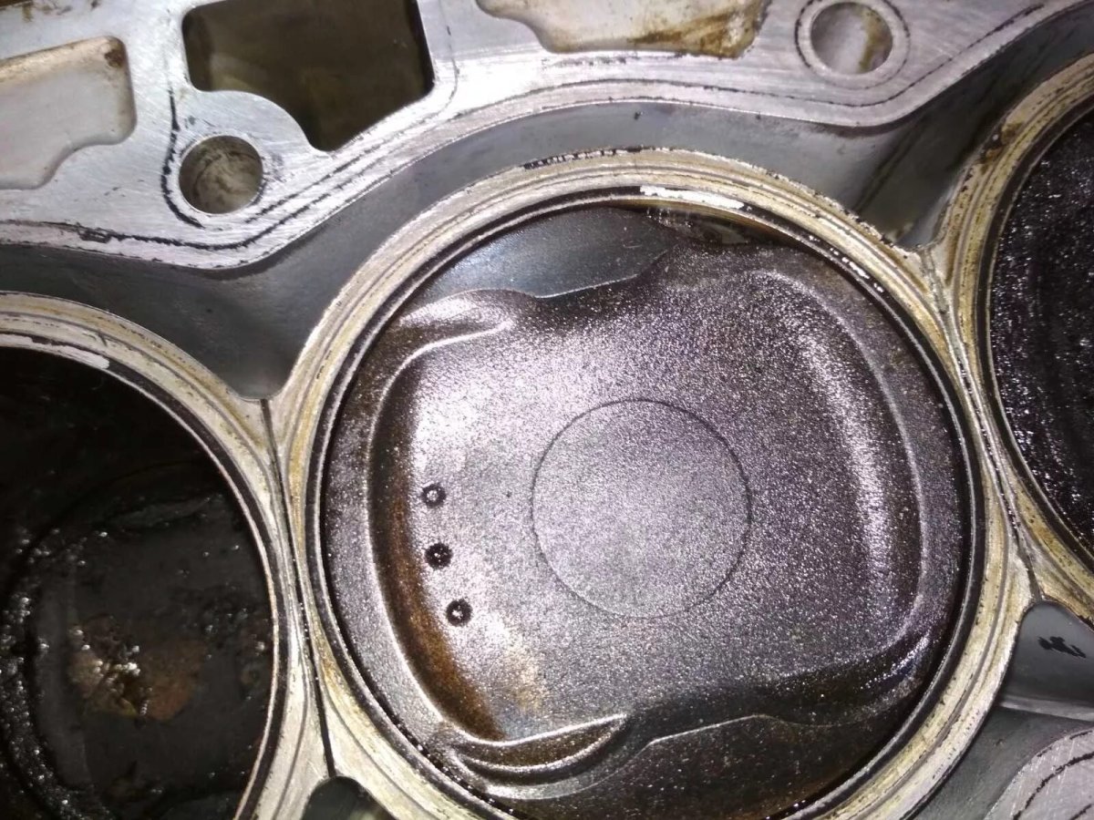 Поршень с масложором