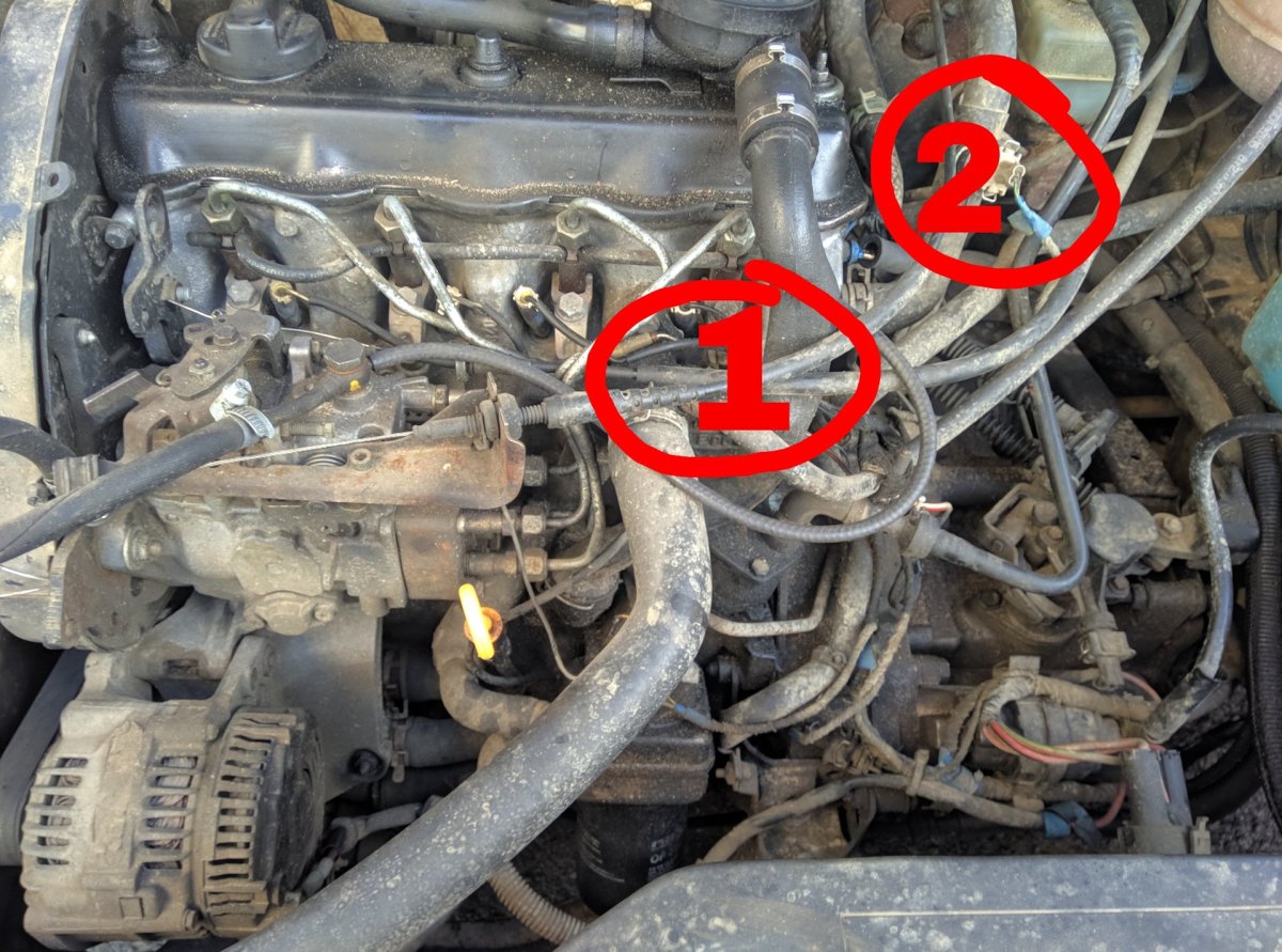 Что за датчик справа от двигателя гольф 4