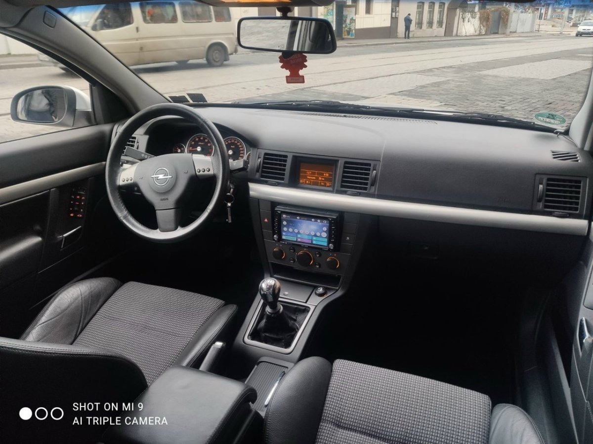 Вектра с 2002 салон