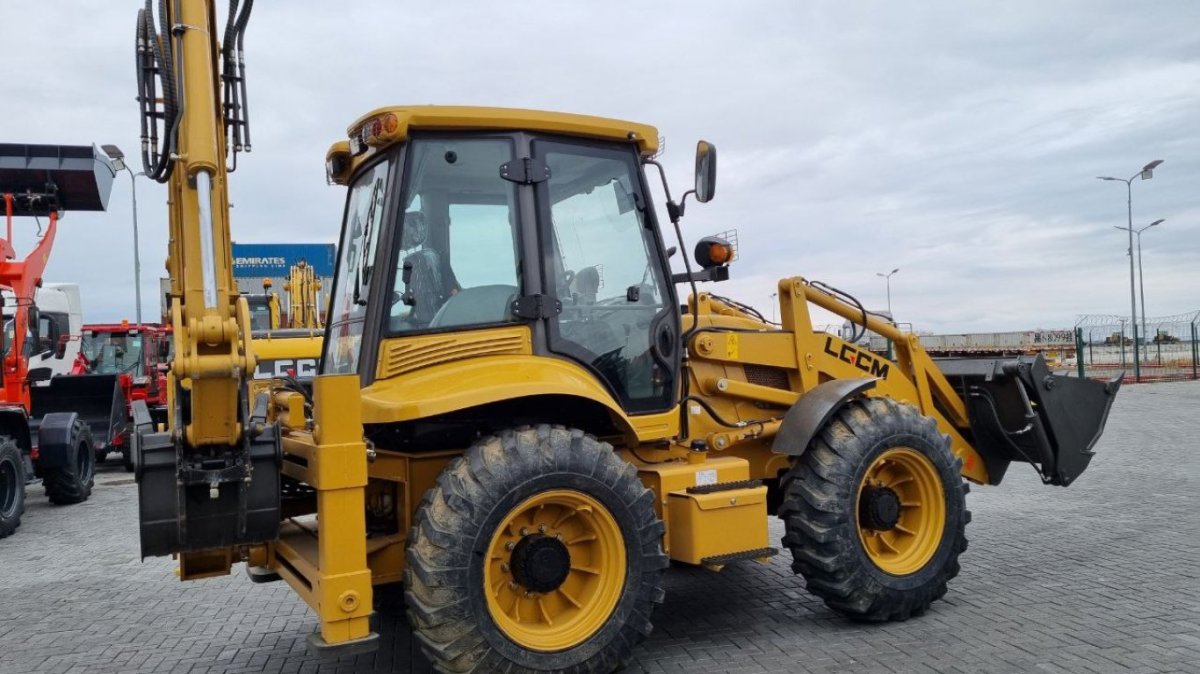 Экскаватор погрузчик RMX