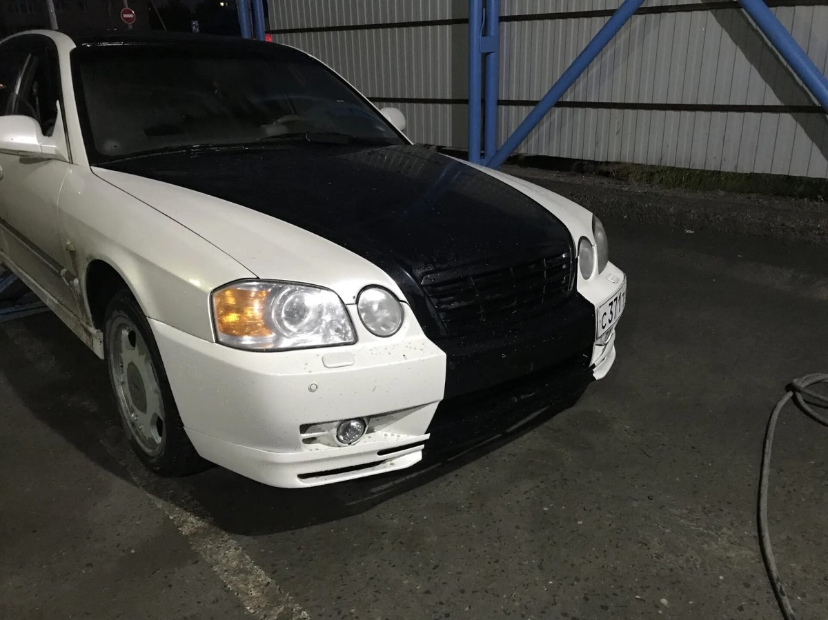 Кия Маджентис 2004