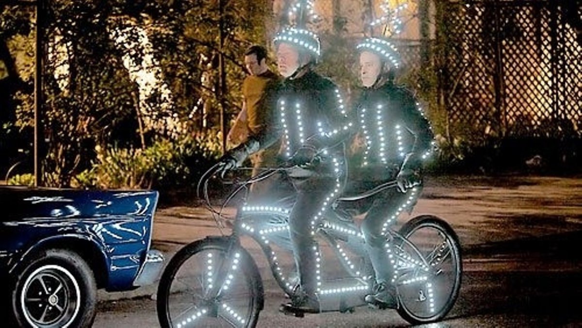 Люди в черном велосипед Тандем