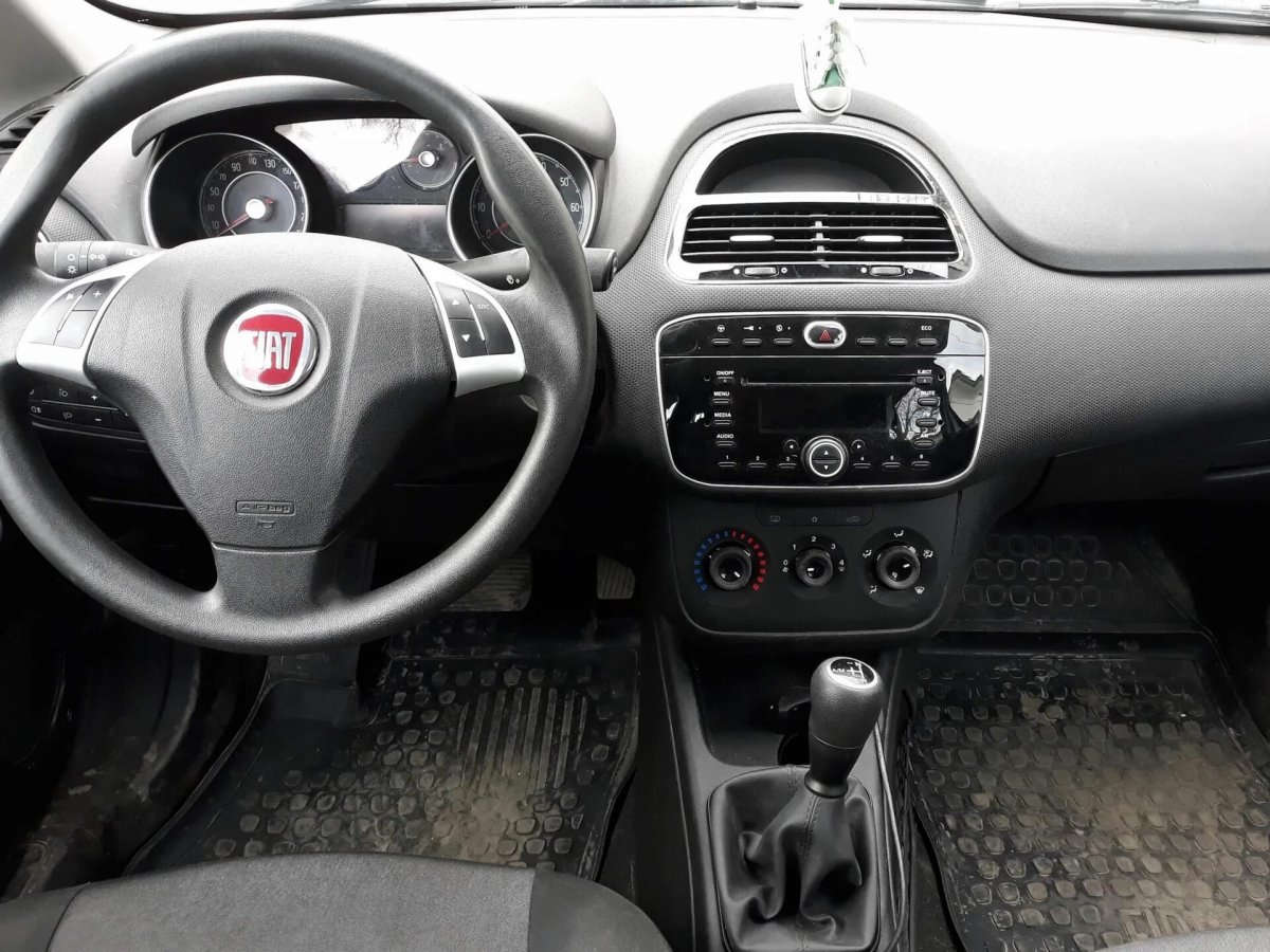 Фиат Гранд Пунто прикуриватель на панели